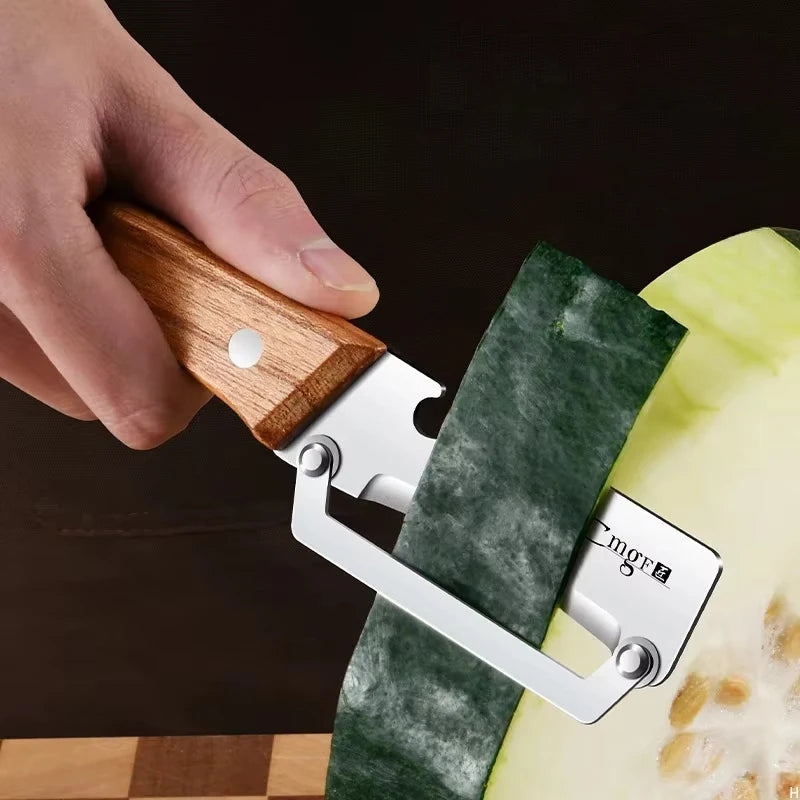 Person using a stainless steel vegetable peeler with a wooden handle on a cucumber.