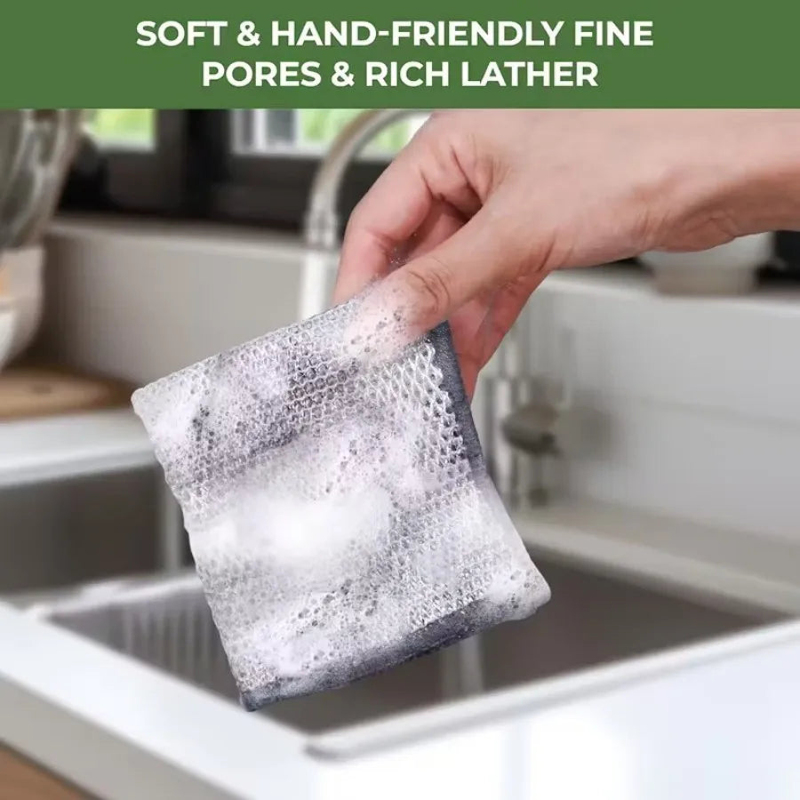 Hand holding a stainless steel scrubber pad with rich lather, ideal for cleaning and tough stains.