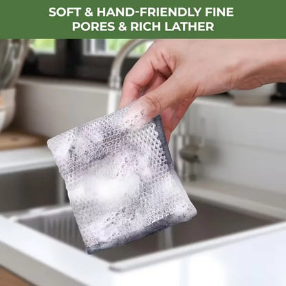Hand holding a stainless steel scrubber pad with rich lather, ideal for cleaning and tough stains.
