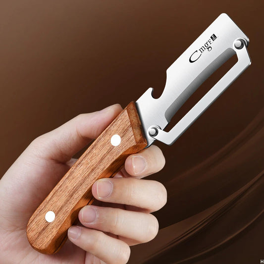 Hand holding a stainless steel vegetable peeler with a wooden handle, ideal for smooth peeling and slicing.